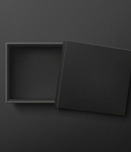 Opened black empty gift box on dark background_